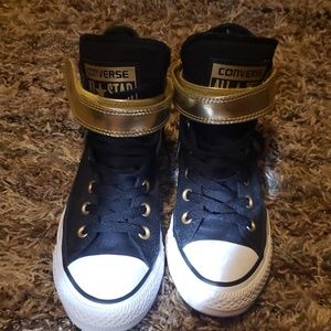Black and gold converse